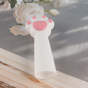 Hot products cat paw shape hand-roll silicone garlic peeler for sale