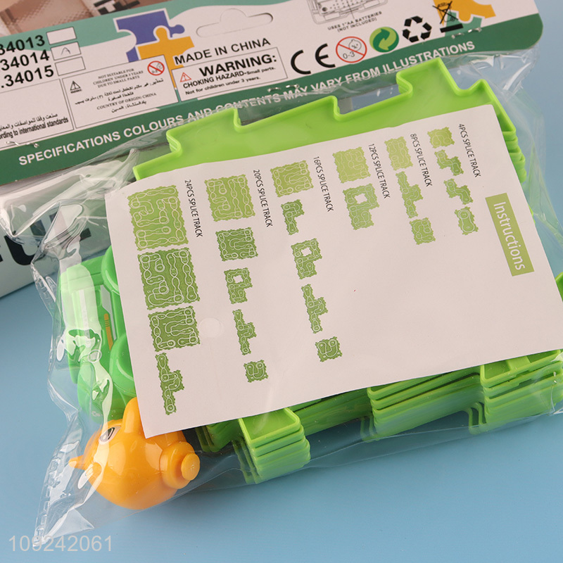 Factory Price Electric Dinosaur Puzzle Rail Car Toy for Boys Girls