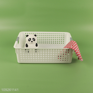 Hot selling home office hollow plastic storage basket with handle